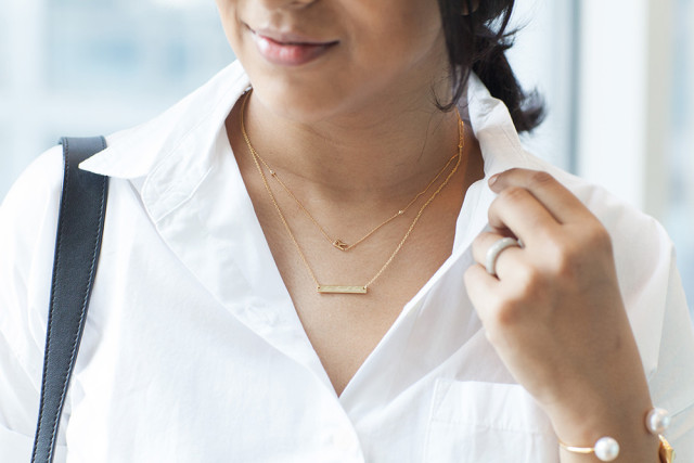 Layered gold necklaces